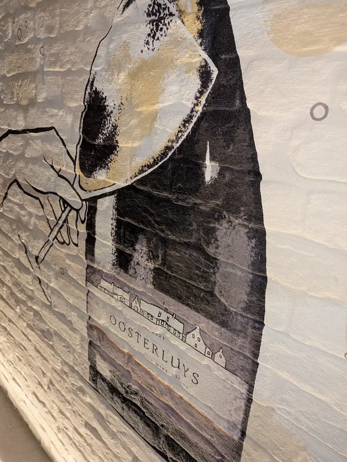 Detail: the glass, with the brick texture showing through the print